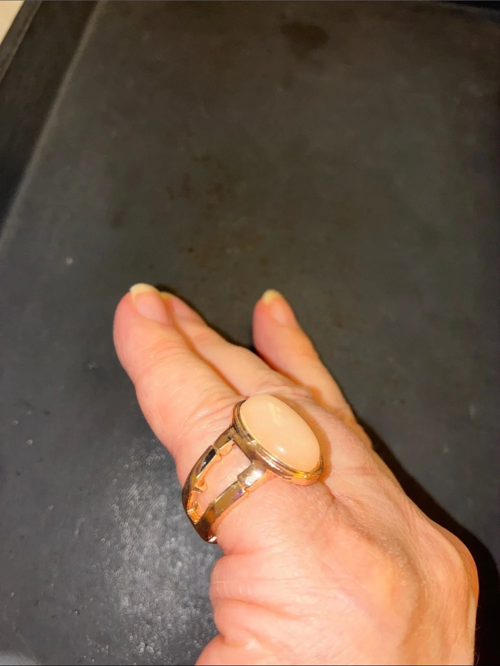Gold-Tone Stretch Ring with Peach Cabochon Center